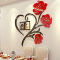 Decorative wall art with red roses and a heart shape in a dining room setting.
