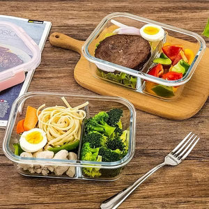 Two glass containers with food on a wooden table