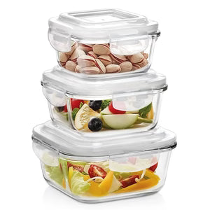 Set of glass food storage containers with lids on a white background